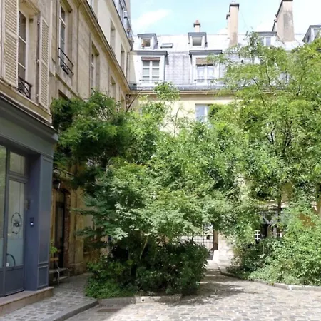 Апартаменты Au Coeur Du Marais, Un Joli !